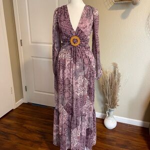 Maxi dress. Jessica Simpson dress. Purple flower print with buckle on top.